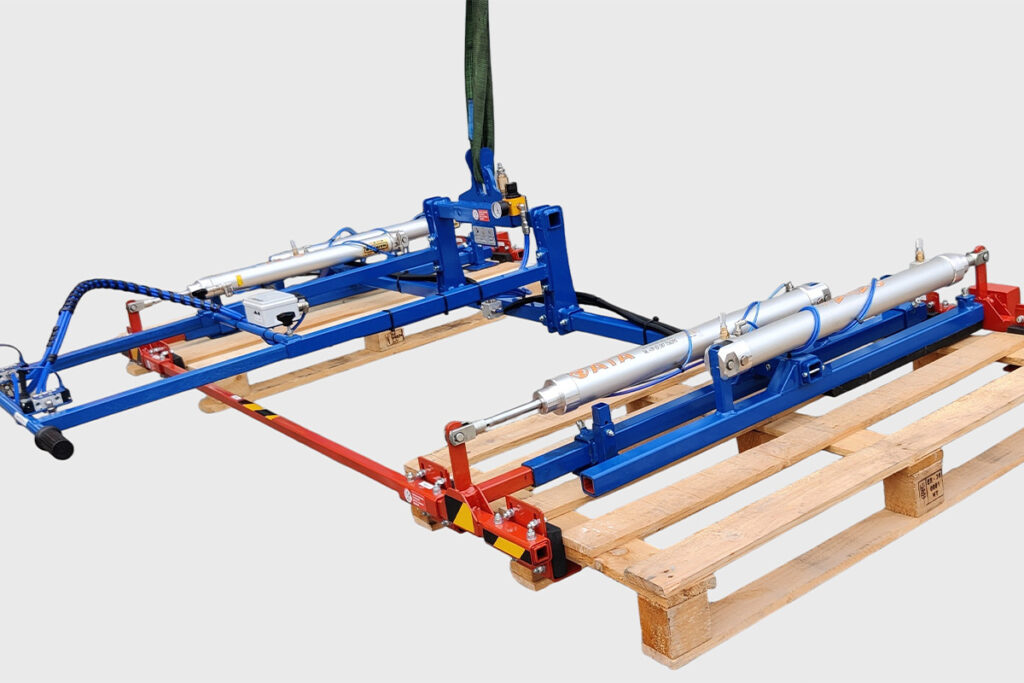 pinza pneumatica per spostare pallets di diverse dimensioni